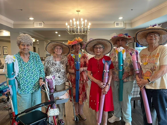 Calumet Trace - a Charter Senior Living Community residents having fun celebrating the Kentucky Derby