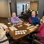 Park Vista Retirement Living - Camanche, IA, residents playing cards