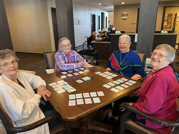 Park Vista Retirement Living - Camanche, IA, residents playing cards