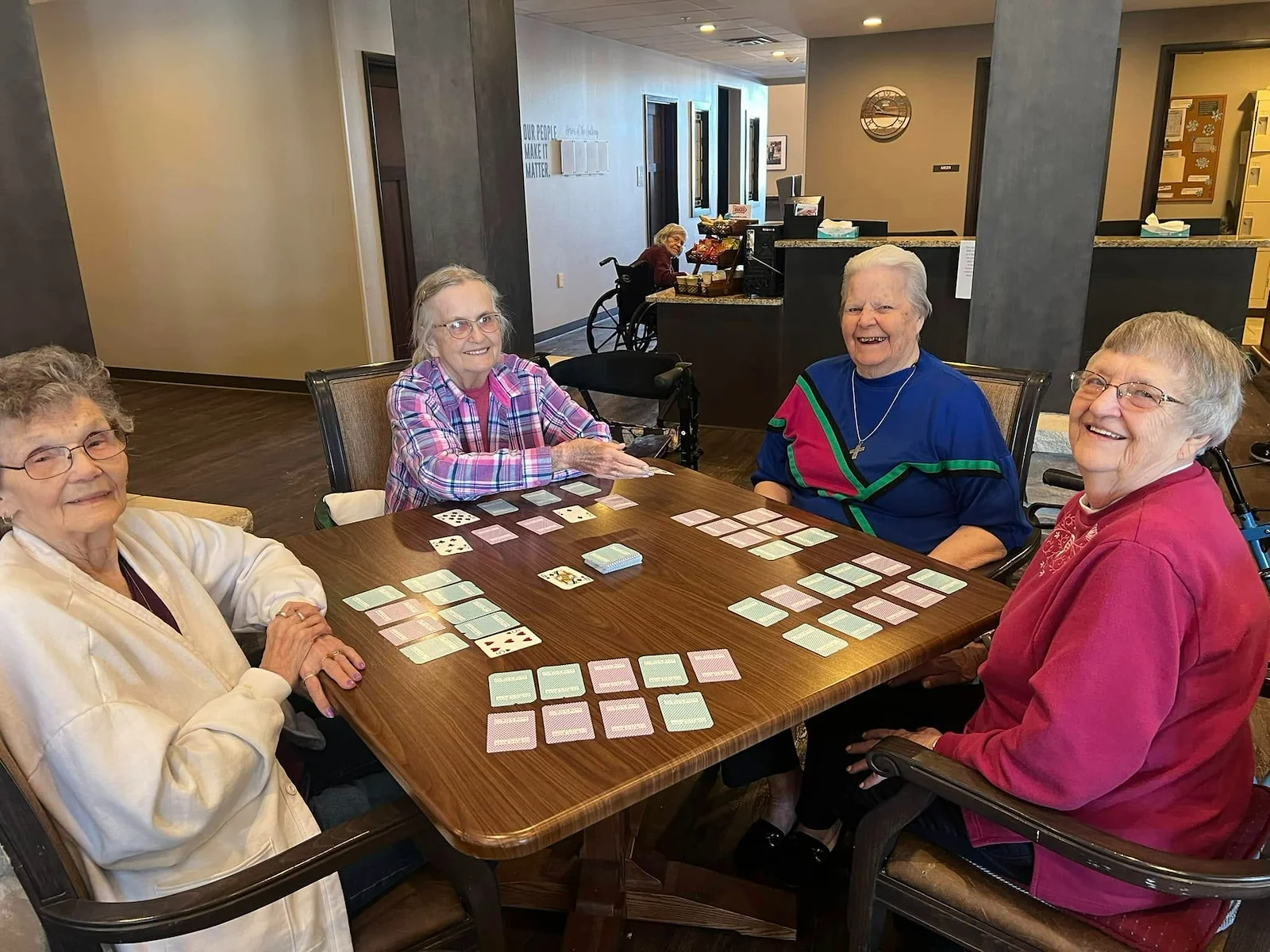 Park Vista Retirement Living - Camanche, IA, residents playing cards