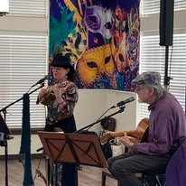 Capitol Ridge Gracious Retirement Living Hawthorn Senior Independent Living in Bristow, Virginia residents putting on a musical performance