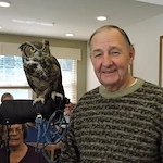 Harvester Place Senior Assisted Living Memory Care in Burr Ridge, IL resident holding an owl