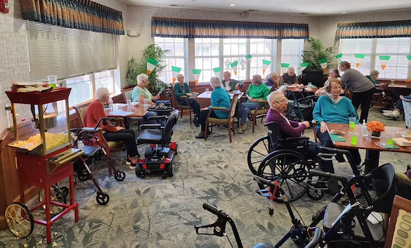 Allisonville Meadows Assisted Living offering assisted living, memory care, and respite care in Fishers, IN, residents in the dining room socializing