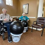 Aberdeen Crossings by New Perspective, senior living community offering assisted living in Highland Heights, OH, residents staying active with an engaging activity