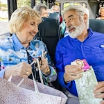 Rosewood Senior Living in Bakersfield, CA, residents on group transportation for shopping trip
