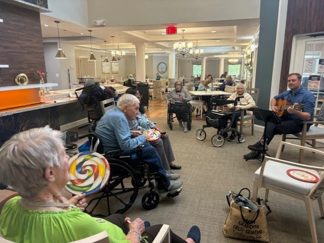 Charter Senior Living of Charlotte residents enjoy music therapy