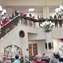 Williams Place Gracious Retirement Living Hawthorn Senior Independent Living in Davidson, North Carolina residents being sang to by kids Christmas concert