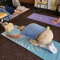 Northridge Gracious Retirement Living Hawthorn Senior Independent Living in Fishers, Indiana residents in a yoga exercise class