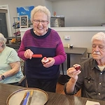 Kidron Bethel Village senior living community and continuing care retirement community (CCRC) offering independent living, assisted living, and respite care in North Newton, KS, resident activity and treats