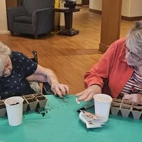 Ascension Living Lakeshore at Siena, assisted living and memory care, Racine, WI, residents gardening and planting flowers