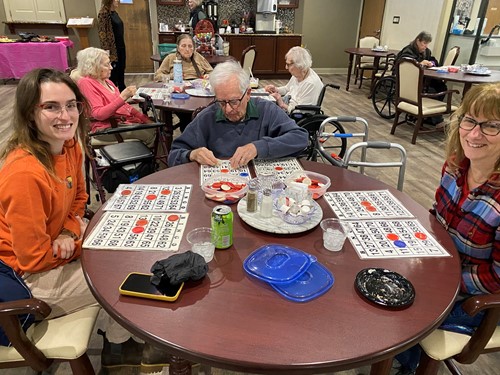 American House Stone Independent Senior Living in Rochester Hills, MI resident playing a game