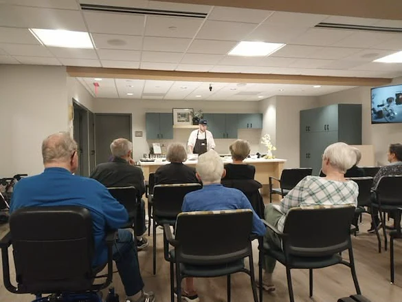 Porter Hills Village residents enjoying a cooking demo