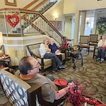 Avamere at Moses Lake senior living community offering independent living, assisted living, and respite care in Moses Lake, WA, residents celebrating Valentine’s Day with snacks and a social gathering