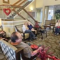 Avamere at Moses Lake senior living community offering independent living, assisted living, and respite care in Moses Lake, WA, residents celebrating Valentine’s Day with snacks and a social gathering