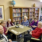 residents meeting in library