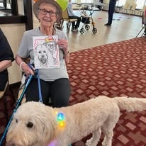 Ivy Creek Gracious Retirement Living Hawthorn Senior independent Living in Glen Mills, Pennsylvania resident with a dog