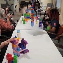 Sonata Coconut Creek seniors building legos together