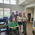 Charter Senior Living of Bowie residents smiling during a celebration