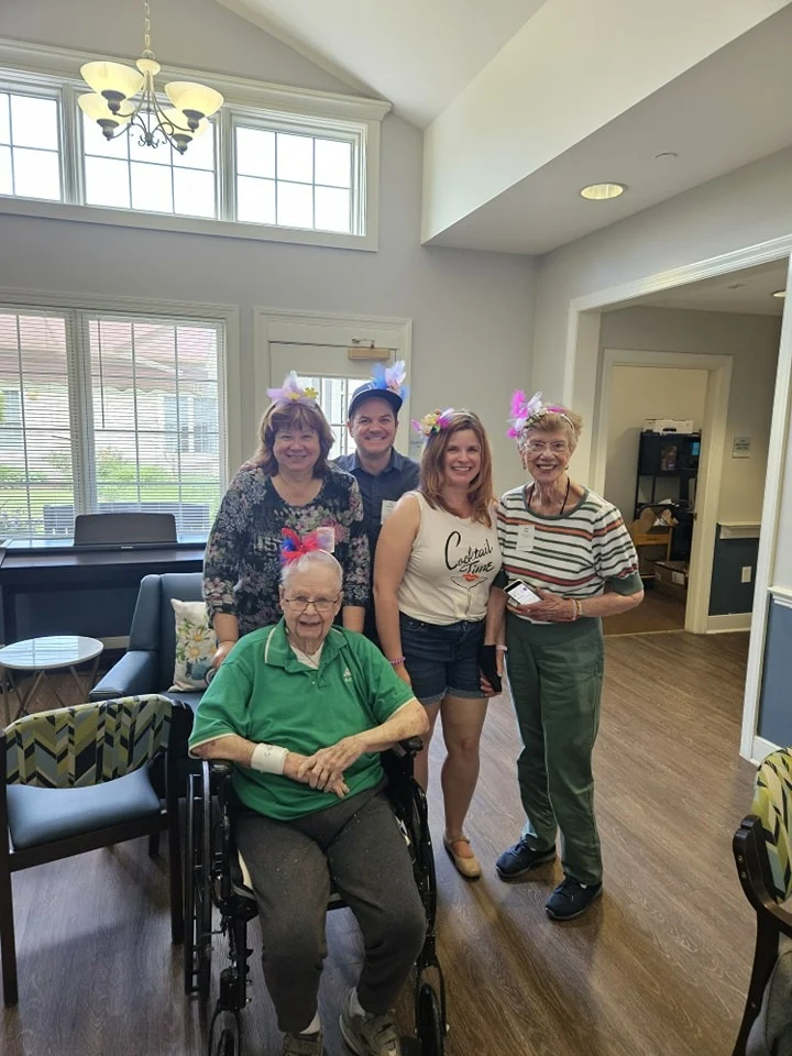Charter Senior Living of Bowie residents smiling during a celebration