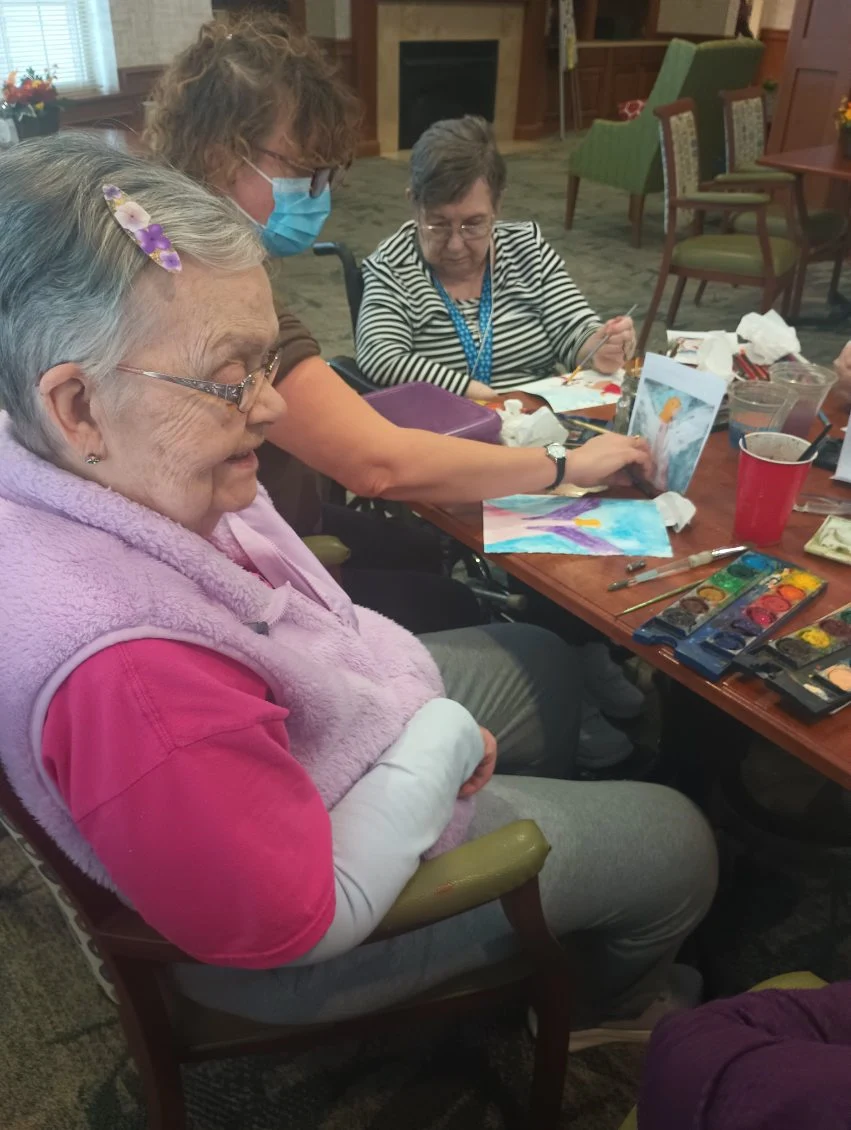 Allisonville Meadows Assisted Living offering assisted living, memory care, and respite care in Fishers, IN, residents doing arts and crafts