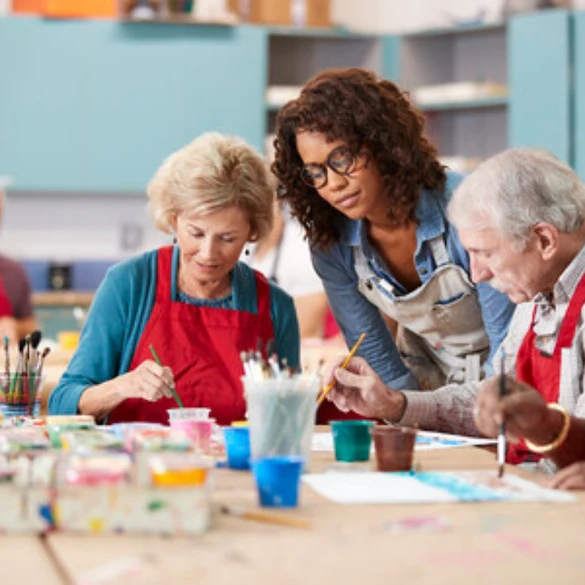 diverse group seniors painting