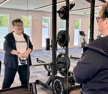 Sage Independence exercising in the gym fitness center