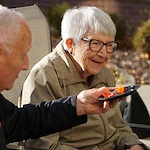 couple at Sage Independence sharing food