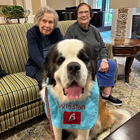 Brookdale Green Hills Cumberland residents enjoying a visit from a dog