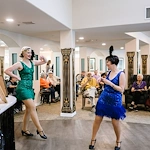 Chateau Pacific Lynnwood, WA, residents enjoy entertainment at a fun celebration