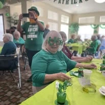 Pioneer Ridge Gracious Retirement Living Hawthorn Senior Independent Living in McKinney, Texas resident celebrating St. Patrick's Day