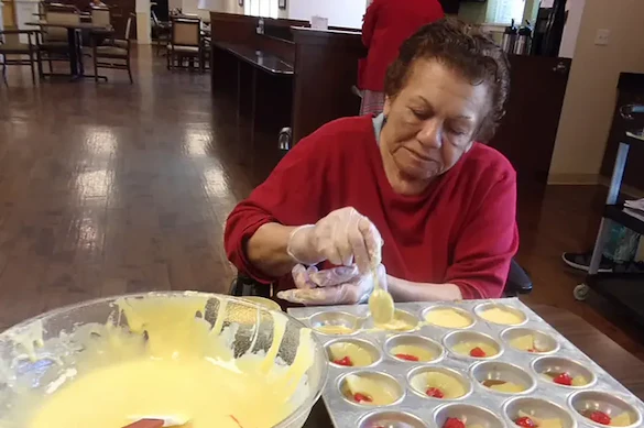 Porter Place Assisted Senior Living Memory Care in Tinley Park, IL resident baking