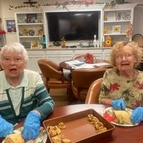 Southern Pines Gracious Retirement Living Hawthorn Senior Independent Living in Southern Pines, North Carolina residents baking