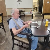Grande Ronde Retirement Residence Senior Living in La Grande, Oregon resident in the dining room