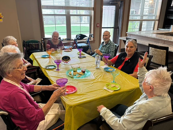 Noel Manor Retirement Living Verona, WI, residents enjoy a celebration