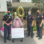 Cottonwood Estates Gracious Retirement Living Hawthorn Senior Independent Living in Alpharetta, Georgia resident birthday party with local law enforcement officers