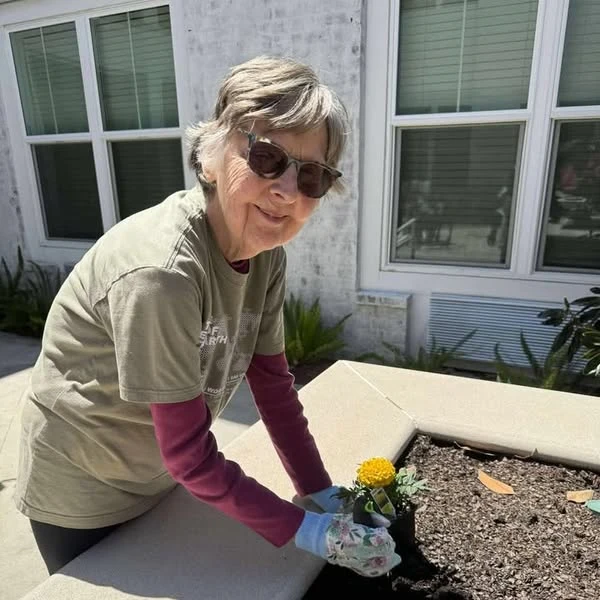 The Blake at Colonial Club residents gardening in honor of Earth Day