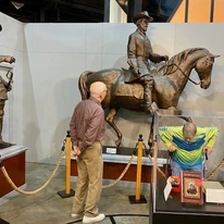 Cottonwood Estates Gracious Retirement Living Hawthorn Senior Independent Living in Alpharetta, Georgia resident browsing at the museum