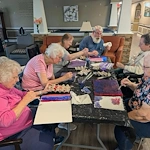 Charter Senior Living of Bay City resident activity - painting