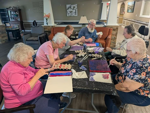 Charter Senior Living of Bay City resident activity - painting