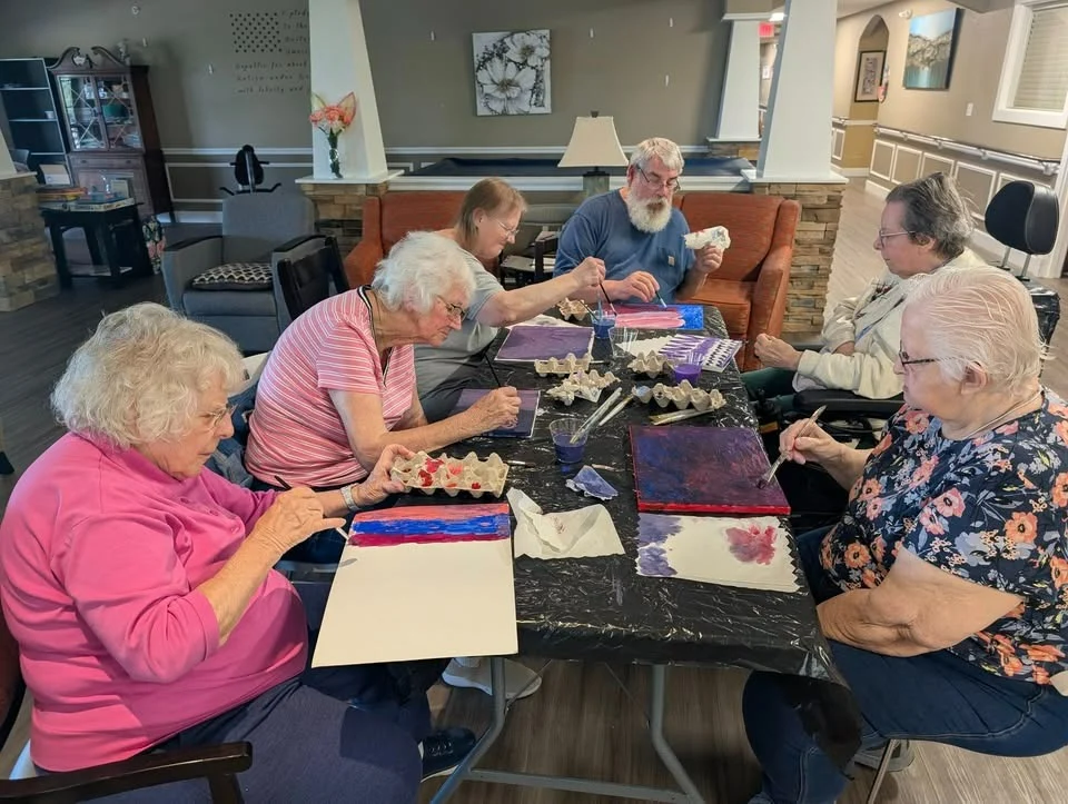 Charter Senior Living of Bay City resident activity - painting