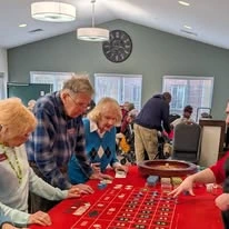 Whispering Pines Gracious Retirement Living Hawthorn Senior Independent Living in Raleigh, North Carolina residents playing roulette
