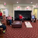 Providence Meadows Gracious Retirement Living Hawthorn Senior Independent Living in Charlotte, North Carolina residents playing cornhole bean bags