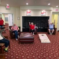 Providence Meadows Gracious Retirement Living Hawthorn Senior Independent Living in Charlotte, North Carolina residents playing cornhole bean bags