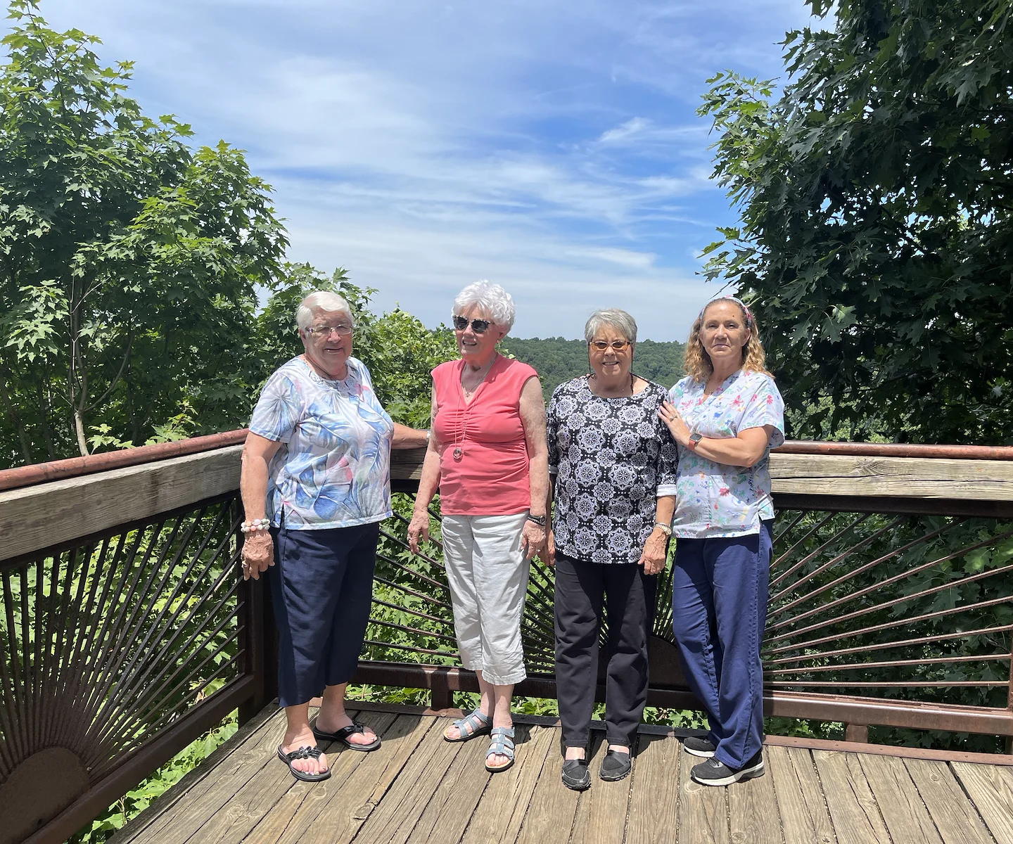 Wesley Manor Assisted Living Community offering assisted living and continuing care retirement community (CCRC) services in Louisville, KY, residents smiling during an off-site trip