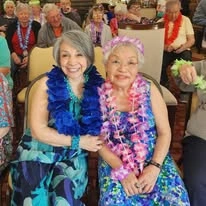 Northridge Gracious Retirement Living Hawthorn Senior Independent Living in Fishers, Indiana residents at a Hawaiian party