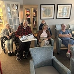 Bennett Place in New Albany, IN, residents gathering to watch a movie