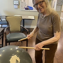 The Seasons@Alexandria (Assisted Living) resident enjoying making music