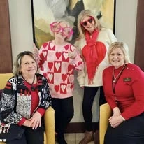Ovation Heartwood Preserve Senior Living in Omaha, Nebraska residents and staff celebrating Valentine's Day