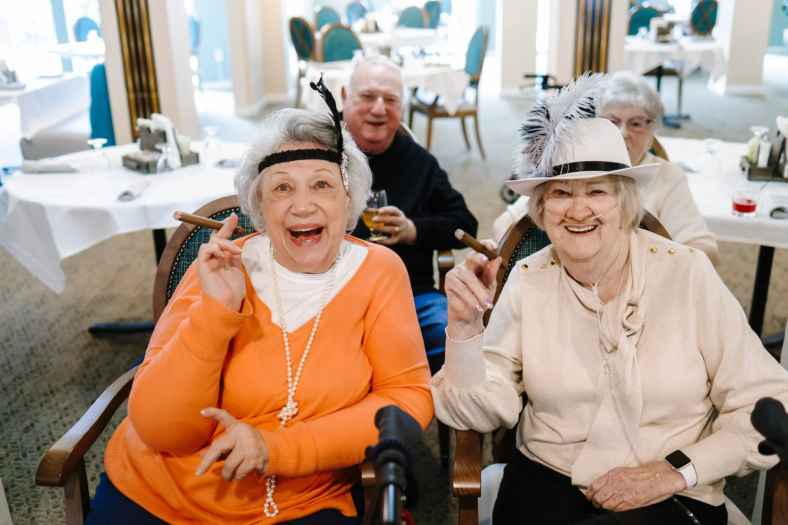 Chateau Pacific Lynnwood, WA, smiling residents enjoying a celebration for the community's 25 years