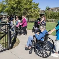 Ascension Living Via Christi Village McLean Senior Living in Wichita, Kansas residents out for a walk